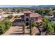 Gorgeous two-story home with a tile roof, three-car garage, and stone accents at 8490 Via De Bellasidra Ct, Las Vegas, NV 89123