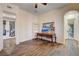 Office featuring hardwood floors, French doors, and a built-in bookcase at 8490 Via De Bellasidra Ct, Las Vegas, NV 89123