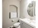 Clean bathroom with gray vanity, shower, and oval mirror at 8543 Alpine Vineyards Ct, Las Vegas, NV 89139