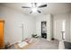 Cozy bedroom with ceiling fan, a closet, and neutral color scheme at 8543 Alpine Vineyards Ct, Las Vegas, NV 89139