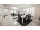 Elegant dining room with marble floors and a chandelier at 8543 Alpine Vineyards Ct, Las Vegas, NV 89139