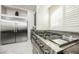 Kitchen detail showcasing the professional grade stainless steel range at 8543 Alpine Vineyards Ct, Las Vegas, NV 89139