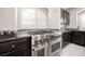 Kitchen detail showing the stainless steel range and granite countertops at 8543 Alpine Vineyards Ct, Las Vegas, NV 89139