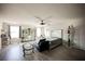 Main bedroom with a king-size bed and a cat tree at 8543 Alpine Vineyards Ct, Las Vegas, NV 89139