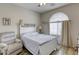 Bedroom with a double bed, and comfortable armchair at 9240 Long Grove Ave, Las Vegas, NV 89149