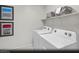 Laundry room with washer, dryer, and additional shelving at 9656 Biedler Ct # Lot 7, Las Vegas, NV 89178