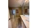 Bathroom with double vanity, shower, and tile floor at , Las Vegas, NV 89118