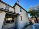 Side view of townhome showcasing entry and windows at , Las Vegas, NV 89118