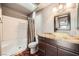 Updated bathroom with granite vanity and a shower/tub combination at 10009 Hemet Dr, Las Vegas, NV 89134