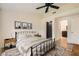 Cozy bedroom with a metal frame bed and modern decor at 10009 Hemet Dr, Las Vegas, NV 89134
