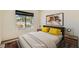 Comfortable bedroom with stylish decor and a large window at 10009 Hemet Dr, Las Vegas, NV 89134