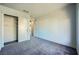 Bedroom with double door closet and grey carpeting at 10009 Hemet Dr, Las Vegas, NV 89134