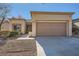 Single story home with attached garage and desert landscaping at 10009 Hemet Dr, Las Vegas, NV 89134