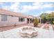 Backyard with patio, fountain, and pergola at 10134 Donald Weese Ct, Las Vegas, NV 89129