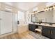 Spa-like bathroom with a walk-in shower and modern fixtures at 10134 Donald Weese Ct, Las Vegas, NV 89129