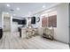 Modern kitchen with dark cabinetry and island at 10134 Donald Weese Ct, Las Vegas, NV 89129