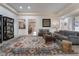 Bright living room with an open floor plan and stylish furniture at 10134 Donald Weese Ct, Las Vegas, NV 89129