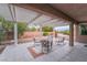 Covered patio with seating area and pergola at 10134 Donald Weese Ct, Las Vegas, NV 89129