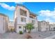 Two-story house with gray exterior and attached garage at 10375 Rose Palisade St, Las Vegas, NV 89141