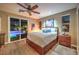 Spacious bedroom with sliding glass doors leading to a pool at 10414 Hemingway Ct, Las Vegas, NV 89149