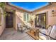 Relaxing courtyard with seating area and access to home at 10414 Hemingway Ct, Las Vegas, NV 89149