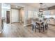 Dining room with a farmhouse table and chandelier at 10414 Hemingway Ct, Las Vegas, NV 89149