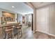 Inviting entryway with a barn door and rustic bar at 10414 Hemingway Ct, Las Vegas, NV 89149