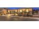 Attractive home exterior at dusk with landscaping at 10414 Hemingway Ct, Las Vegas, NV 89149