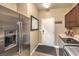 Laundry room with stainless steel appliances and storage at 10414 Hemingway Ct, Las Vegas, NV 89149