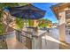 Modern outdoor kitchen with grill and sink at 10414 Hemingway Ct, Las Vegas, NV 89149