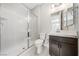 Bathroom features a walk-in shower and modern vanity at 1070 Kelly Brook Ln, Henderson, NV 89011