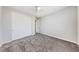 Spacious bedroom with grey carpet and double door closet at 1070 Kelly Brook Ln, Henderson, NV 89011