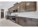 Modern kitchen with stainless steel appliances and ample counter space at 1070 Kelly Brook Ln, Henderson, NV 89011