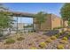 Central Park Pool house with landscaping at 1070 Kelly Brook Ln, Henderson, NV 89011