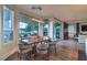 Breakfast nook with wooden table and chairs, overlooking the backyard at 1705 Corta Bella Dr, Las Vegas, NV 89134