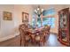 Formal dining room with a large table and hardwood floors at 1705 Corta Bella Dr, Las Vegas, NV 89134