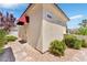 Private casita with a red awning and paved pathway at 1717 Warrington Dr, Henderson, NV 89052