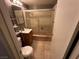 Clean bathroom with shower/tub combo and tile flooring at 1925 E Saint Louis Ave, Las Vegas, NV 89104