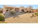 Spacious backyard with gravel and covered patio at 2000 Poppywood Ave, Henderson, NV 89012