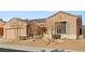 One-story house with solar panels, landscaping, and a two-car garage at 2000 Poppywood Ave, Henderson, NV 89012