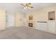 Spacious living room featuring a fireplace and built-in shelving at 2000 Poppywood Ave, Henderson, NV 89012