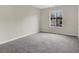 Spacious bedroom with grey carpet and a window at 2200 S Fort Apache Rd # 1101, Las Vegas, NV 89117