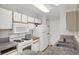 Kitchen with white appliances and granite countertops at 2200 S Fort Apache Rd # 1101, Las Vegas, NV 89117