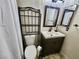 Bathroom with single sink vanity and toilet at 2253 High Dunes Ln, Laughlin, NV 89029