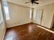 Spacious bedroom with wood-look tile flooring at 2253 High Dunes Ln, Laughlin, NV 89029