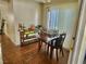 Small dining area with wood table and chairs at 2253 High Dunes Ln, Laughlin, NV 89029