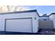 White garage door with address number 2253 visible at 2253 High Dunes Ln, Laughlin, NV 89029