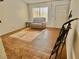 Bright living room with wood-look tile floors at 2253 High Dunes Ln, Laughlin, NV 89029