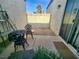 Small patio with wrought iron furniture at 2253 High Dunes Ln, Laughlin, NV 89029