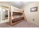 Cozy bedroom with a built-in bunk bed and futon at 2254 High Dunes Ln, Laughlin, NV 89029